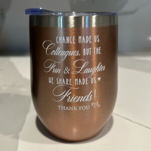 Rose gold tumbler.